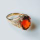 Anello in oro con Granato Essonite